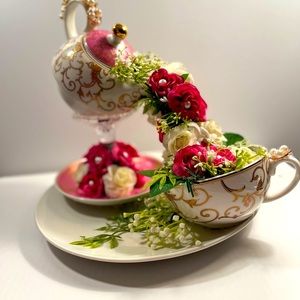 Beautiful delicate handmade floating Grace Teawear teapot with elegant design.